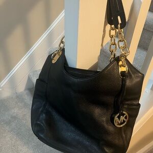 Michael Kors Black Hobo Bag with Gold Accents